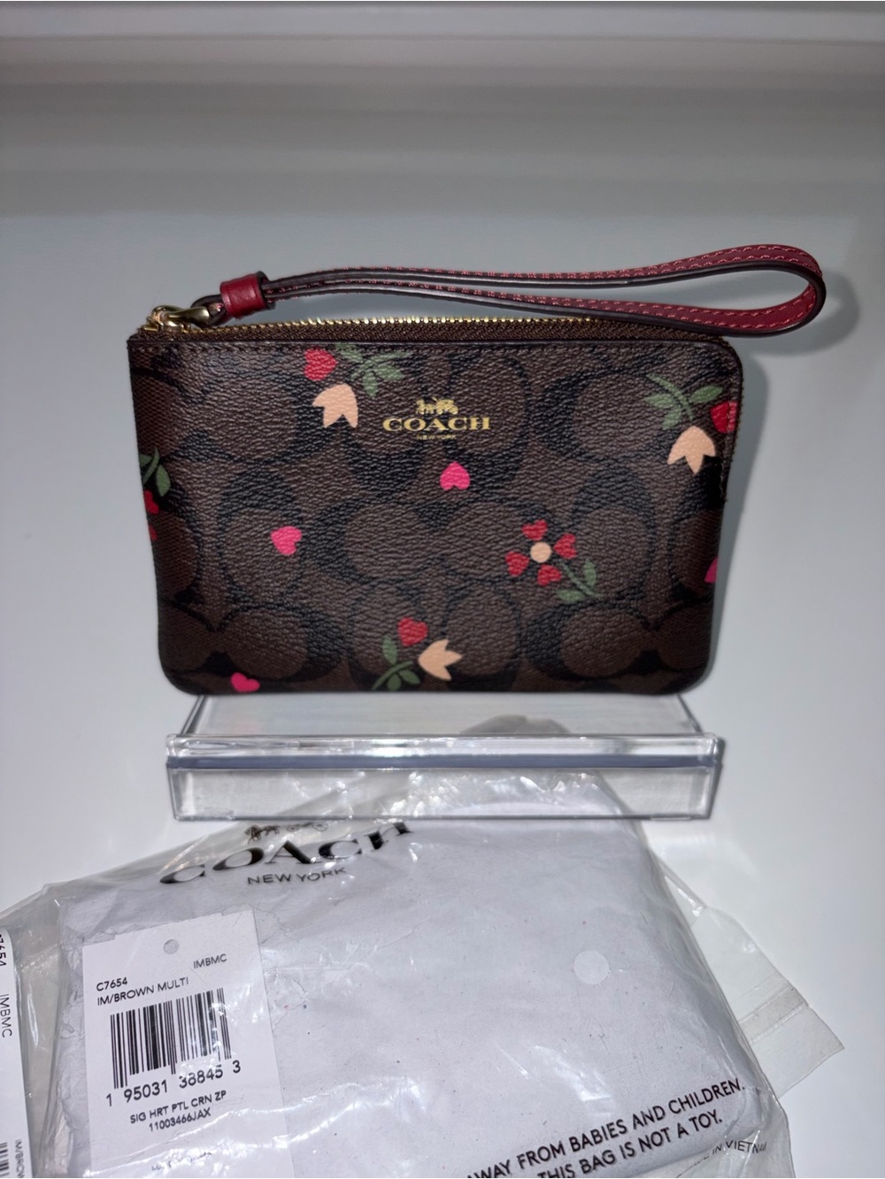 COACH Brown With Hearts and Floral Zip Wristlet - Brown Multi